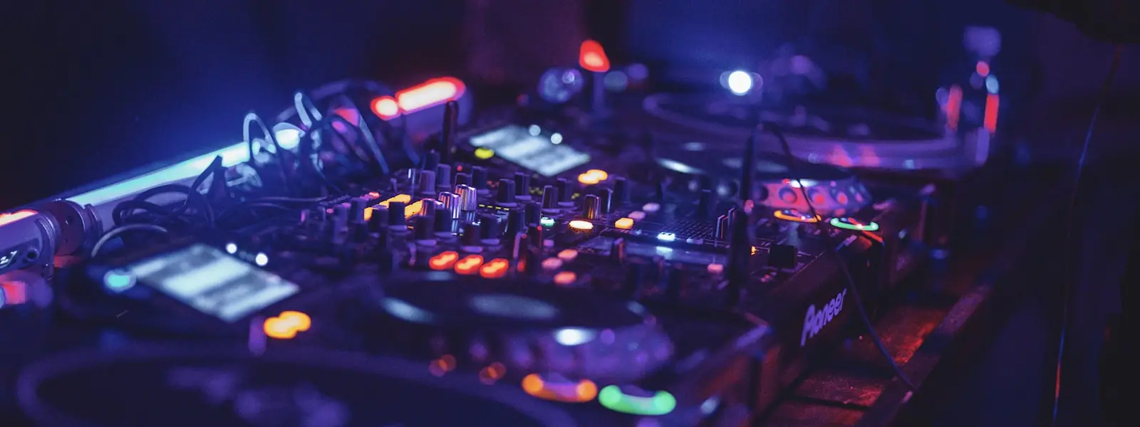 Close-up of a DJ mixer's channel strip