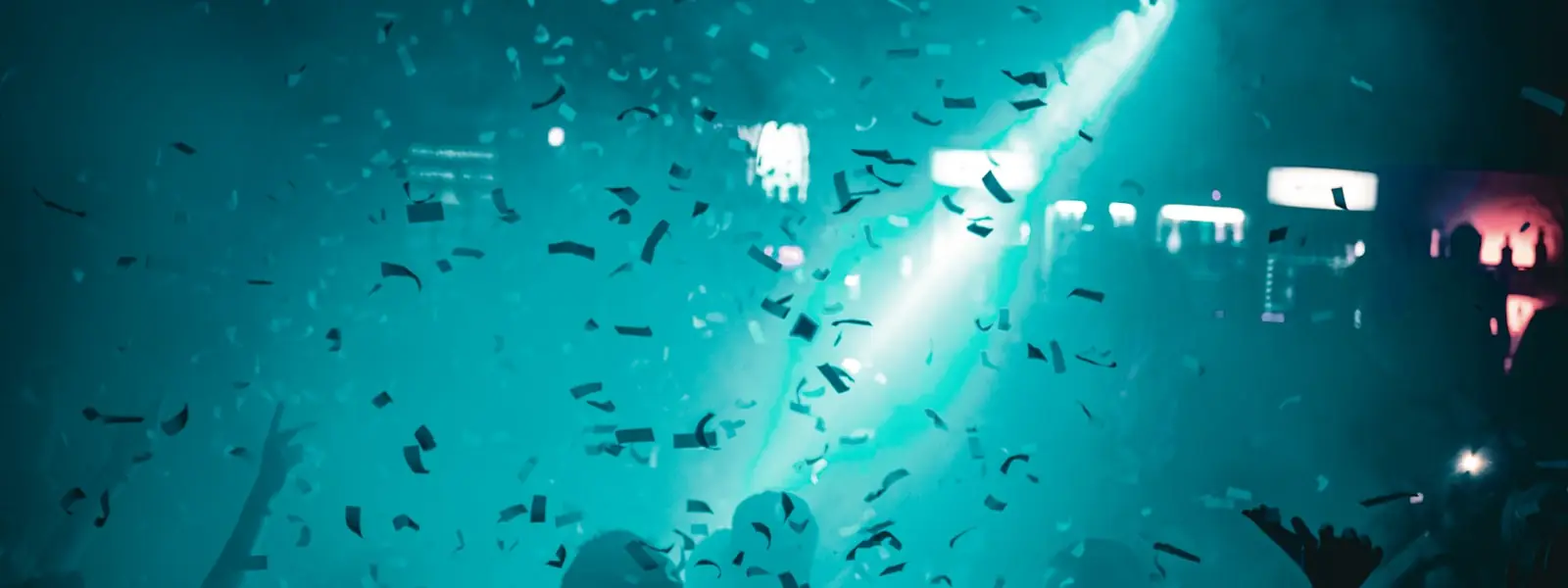 A crowd with hands in the air