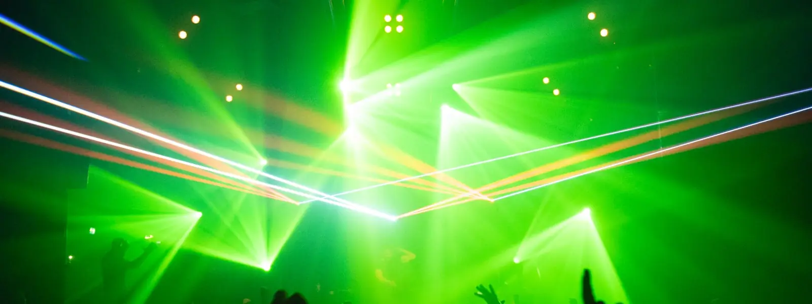 Dancers under green light