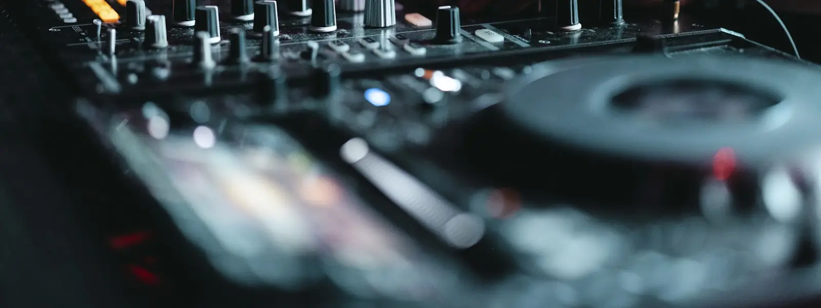 A DJ at work behind the decks